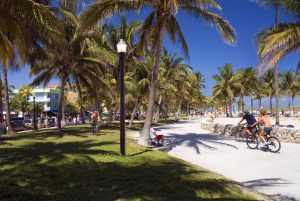 Florida, Miami, South Beach, Couple bike riding.